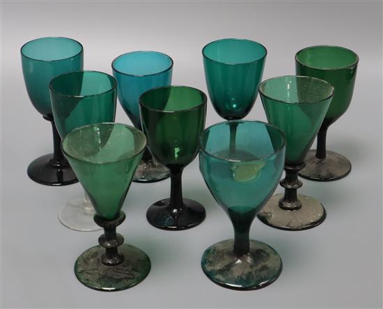 Nine various 19th century green wine glasses